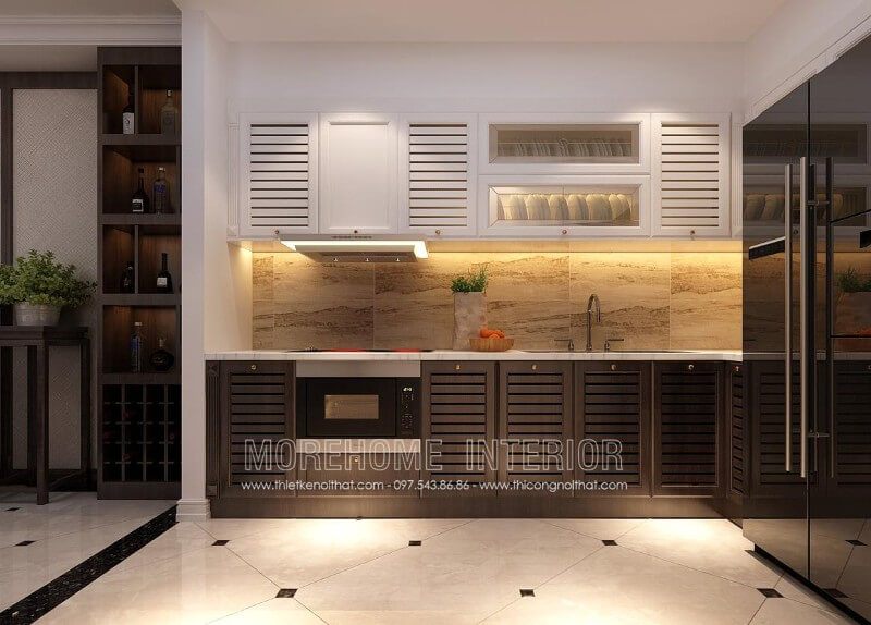 Mẫu tủ bếp gỗ nhập khẩu phun sơn cao cấp mang lại vẻ đẹp sang trọng và ấm áp.